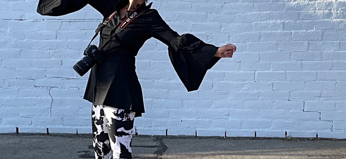 Artist Jennifer Rae Ochs wearing her Black and White Collection Yoga Leggings